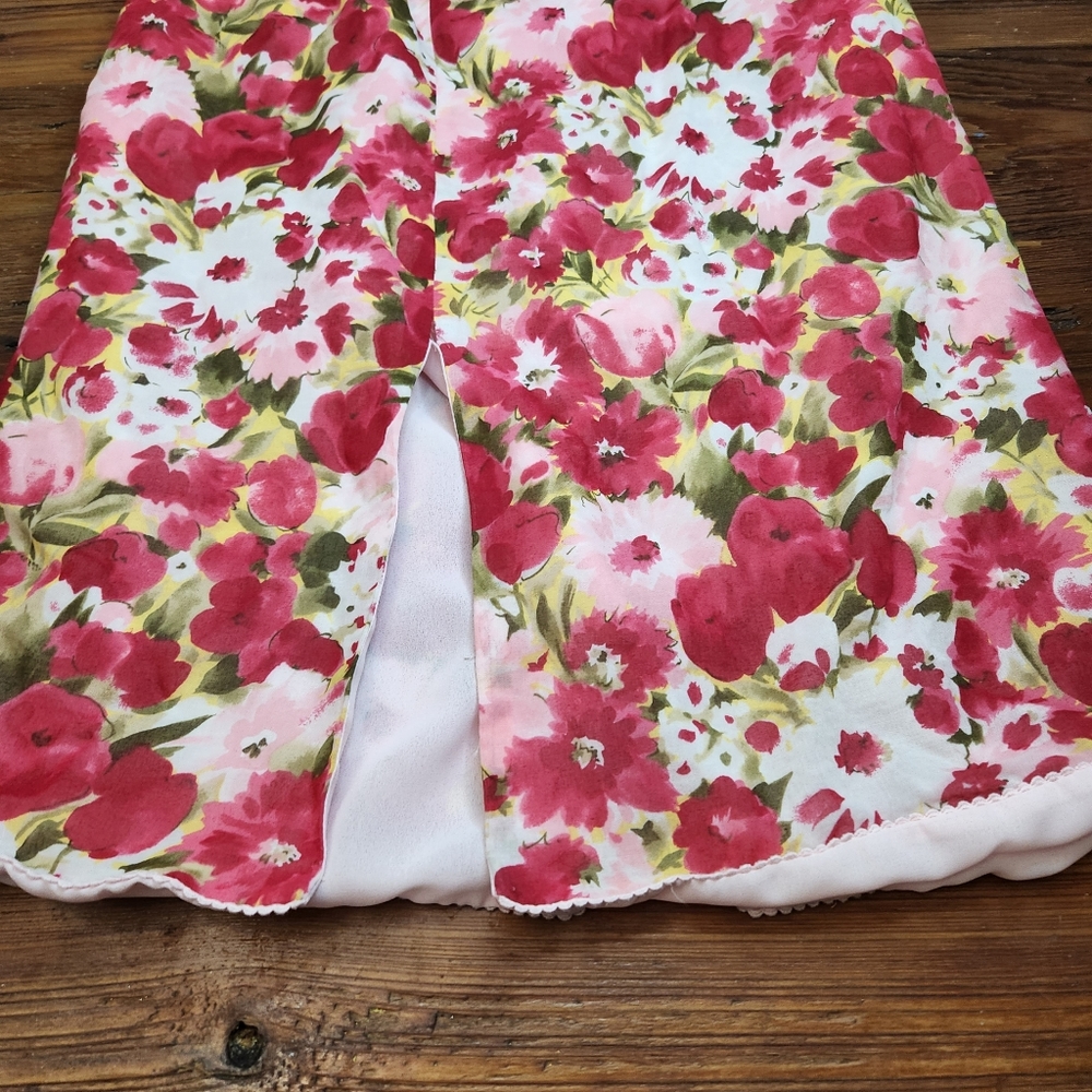 LAUNDRY SIZE 6 LINED SKIRT WITH PINKS WHITE,AND GREEN FLIRAL DESIGN